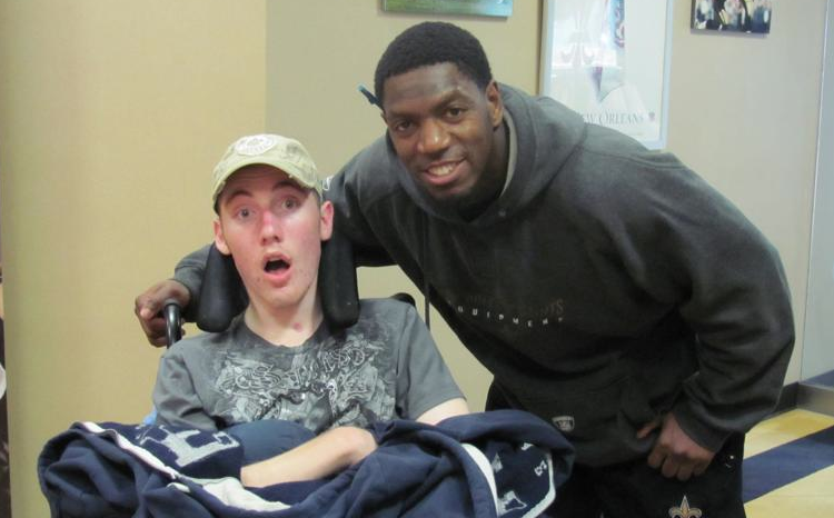 Picture 6 Zach with New Orleans Saint Jonathan Vilma