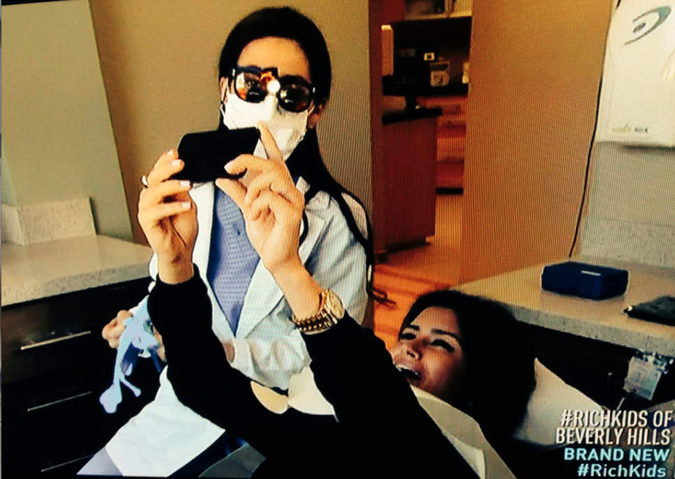Roxy shoots a selfie in the dentist's chair.